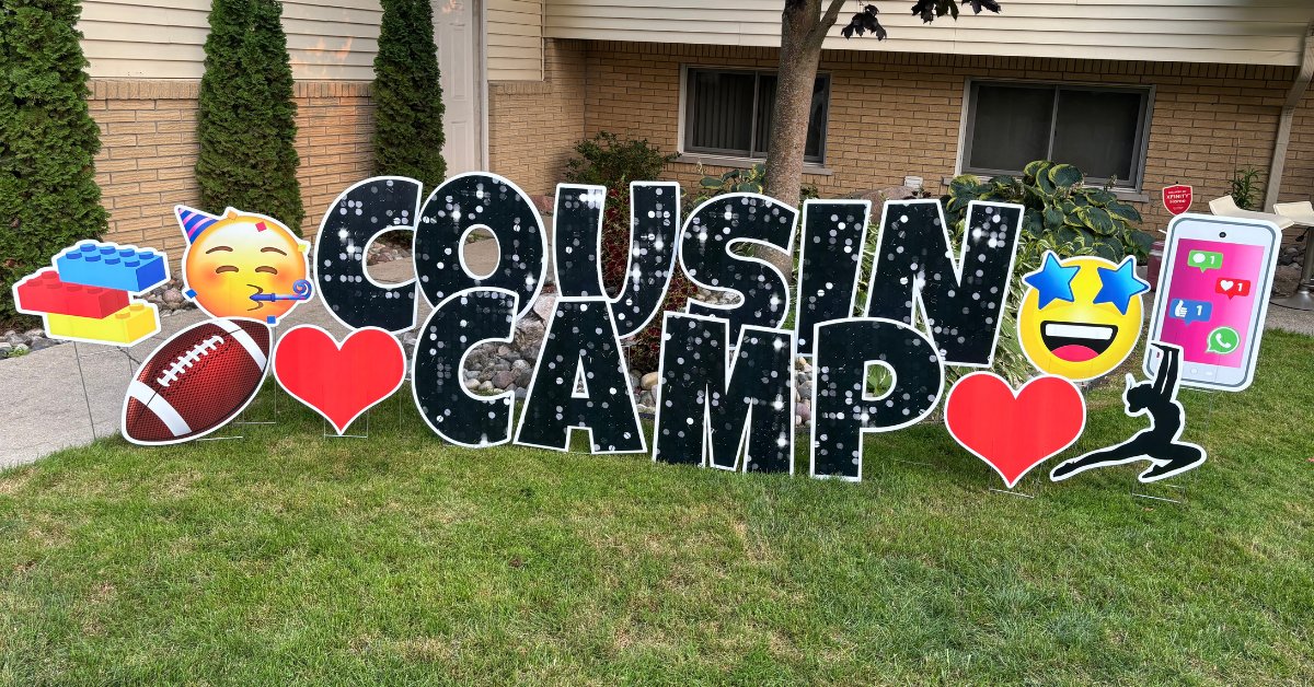 Cousin Camp celebration yard card display